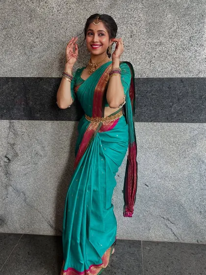 Another look at my Amma's beautiful wedding saree. Wearing it feels like being wrapped in her love and blessings, a true connection to my parampara.