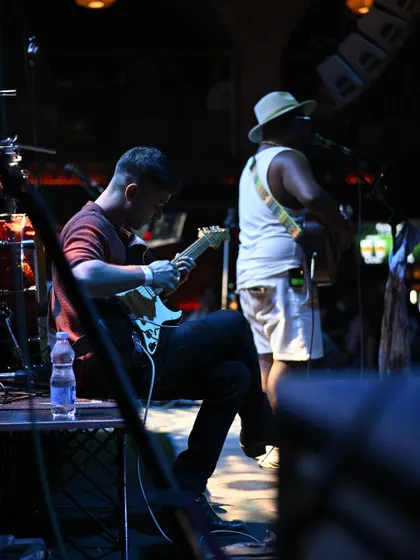 Another angle of my guitarist during his solo. The concentration and passion are clear to see.