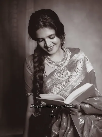 The same beautiful look in black and white, emphasizing the timeless quality of traditional South Indian beauty.