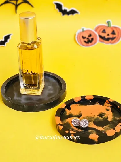 These mini coasters can also be used as trinket trays for your perfume or earrings, as shown here. The orange and black and smoky black designs look great together.
