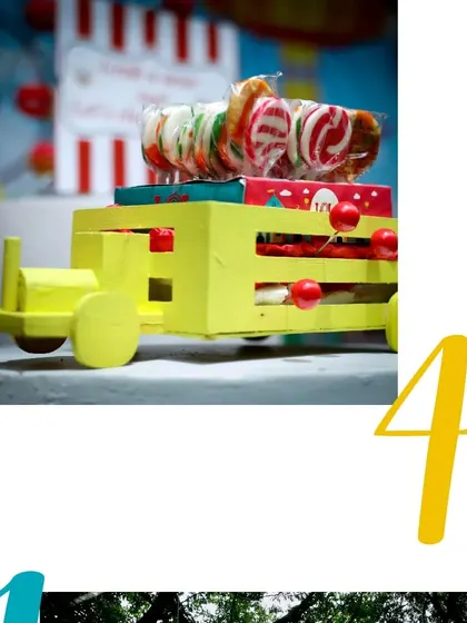 Yummy treats and candies, like these lollipops in a toy truck, are an essential and fun part of any carnival.