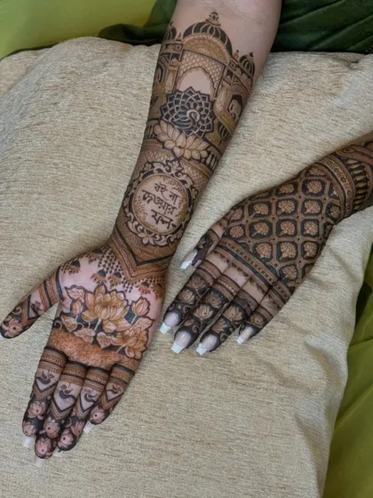A full view of the design, with a floral pattern on one palm and a geometric pattern on the back of the other hand, showing versatility in style.