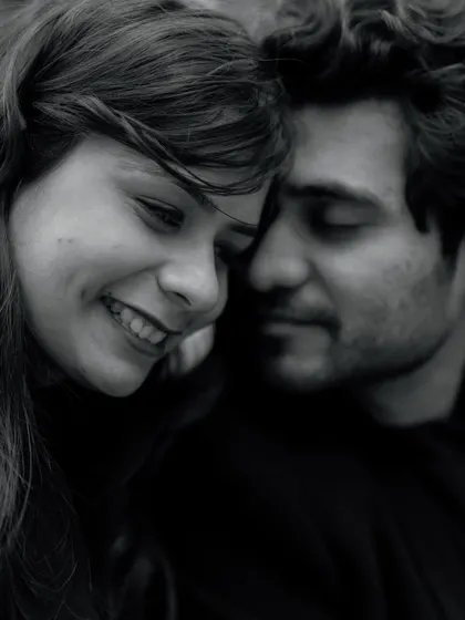 A beautiful, soft-focus close-up in black and white. This image captures the tenderness and affection between the couple in a very artistic way.