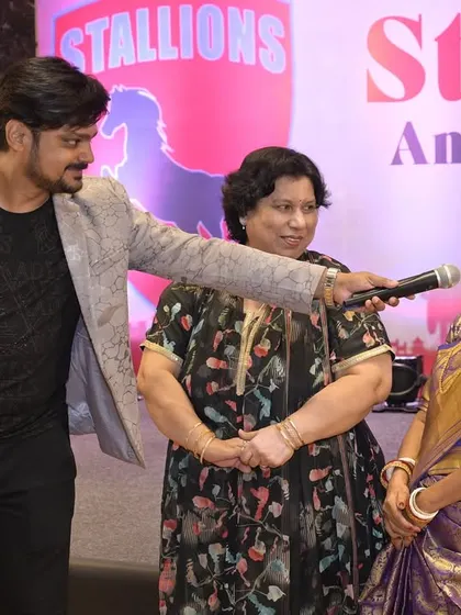 Engaging with guests during an interactive segment. I make sure everyone feels comfortable and has a good time, whether they are on stage or in their seats.