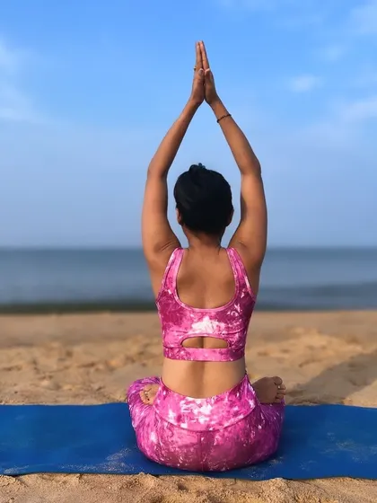 Inhale the future, exhale the past. Seated on the beach, connecting with my breath, which is the anchor that brings us to the present moment.