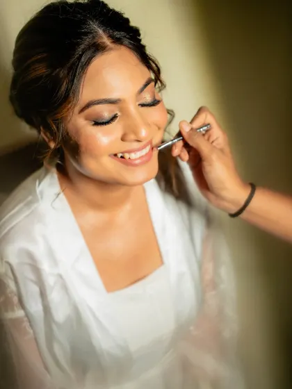 A behind-the-scenes glimpse of creating the perfect bridal look for our bride from Dubai, focusing on a flawless airbrush application.