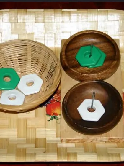 This bead sorting activity is more than just play. It helps develop fine motor skills, introduces early math concepts like sorting and classification, and requires concentration to complete the task.