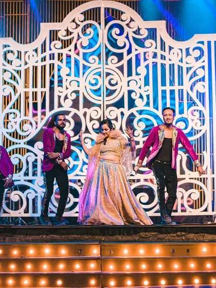 The bride and groom join our professional dancers on stage for a high-energy group number, making them feel like the lead stars of their own blockbuster film.