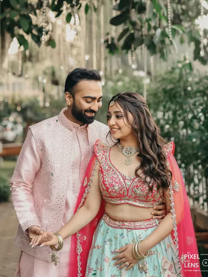 The look of love. We create the perfect setting, but it's the connection between the couple that brings the magic. This is a beautiful candid moment from their pastel-themed Haldi ceremony.
