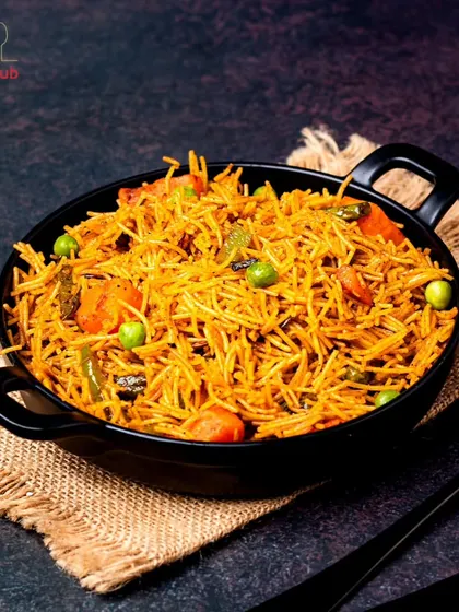 Savoring the delicate dance of flavors in this vermicelli pulao. Loaded with vegetables, it's a light yet satisfying one-pot meal.