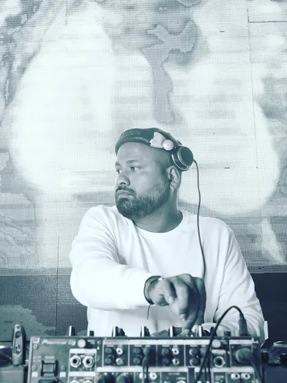 A black and white portrait from a gig, capturing a moment of concentration. Every set is a journey, and I'm focused on making it a great one.