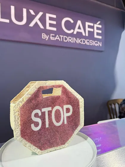 A stop sign you can eat. This creatively designed cracker was part of our playful menu at the Luxe Café by EatDrinkDesign, showing that we don't take ourselves too seriously.