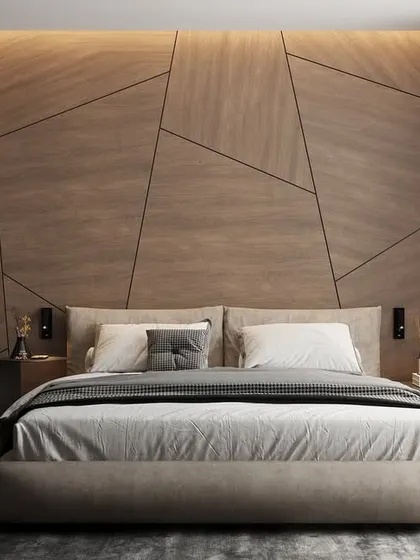 A full view of the geometric wood accent wall, which serves as a stunning headboard and the primary design feature of this minimalist bedroom.