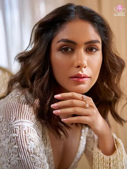 Beauty in the details. This shot highlights the delicate CaratLane jewelry and flawless makeup that completed Mrunal's cover look for HT City.