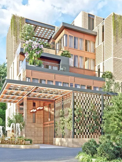 Renderings of 'Sriniketan', a guesthouse for pilgrims in Tirupati. The design features terraced gardens and an ornate facade inspired by temple architecture.