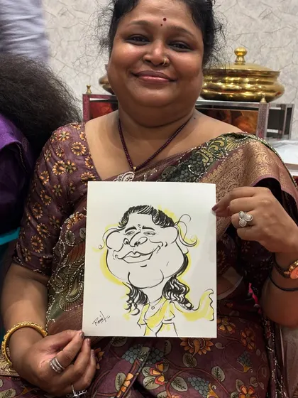 A lovely lady with her caricature, a beautiful memento from a fun evening.
