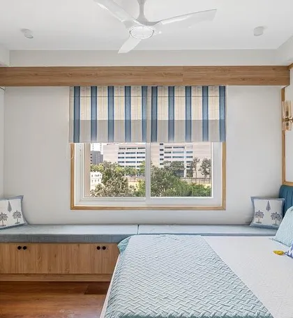 Another angle of the bed and bay window, a perfect spot for a child to read and relax.