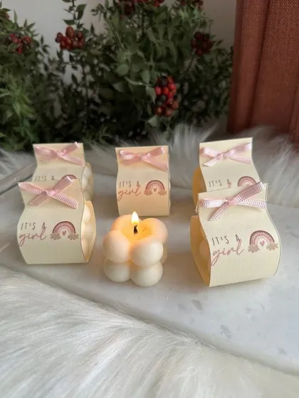 A closer look at the "It's a Girl" bubble candle gift set. The lit candle in the front shows how beautifully they burn.