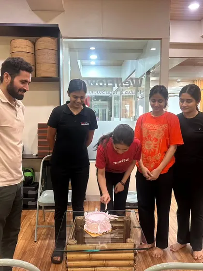 A moment of joy and celebration at the studio. Building a strong community is just as important as building a strong core.