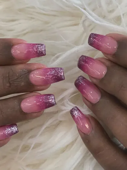 A glamorous purple ombré with a sparkling glitter fade at the tips.
