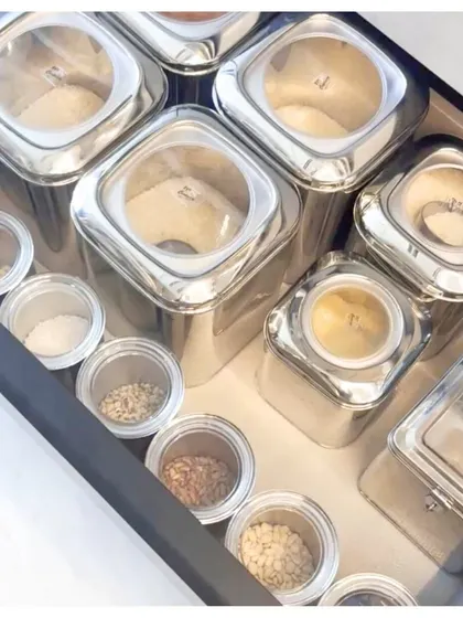 For a clean and uniform look in kitchen drawers, I often recommend stainless steel containers with clear lids. This allows you to see the contents at a glance while keeping your spices and grains neatly organized.