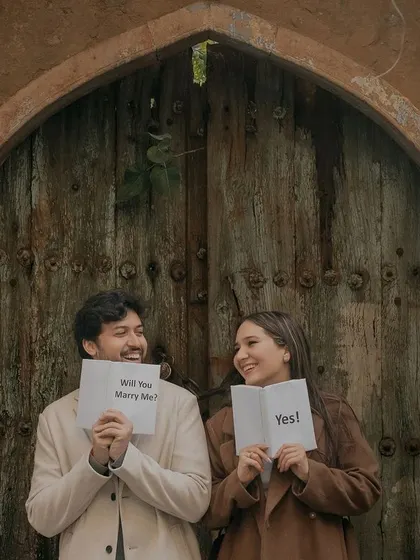 A sweet and simple proposal moment captured during a pre-wedding shoot in Old Delhi. We love incorporating personal stories and save-the-date ideas into our sessions.