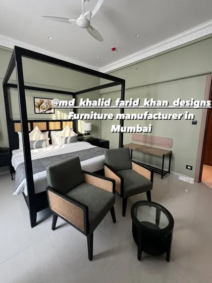 Another perspective of the hotel room, showing the placement of the furniture to create a functional and spacious feel. The set includes the bed, chairs, and a small coffee table.