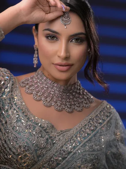 A different angle of the jewelry shoot look, showing how the maang tikka is perfectly placed and the makeup complements the cool tones of the diamonds.