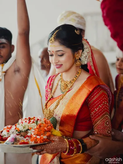The bride's entrance. Her makeup is designed to be impactful from a distance and flawless up close, ensuring she looks stunning throughout her walk down the aisle.