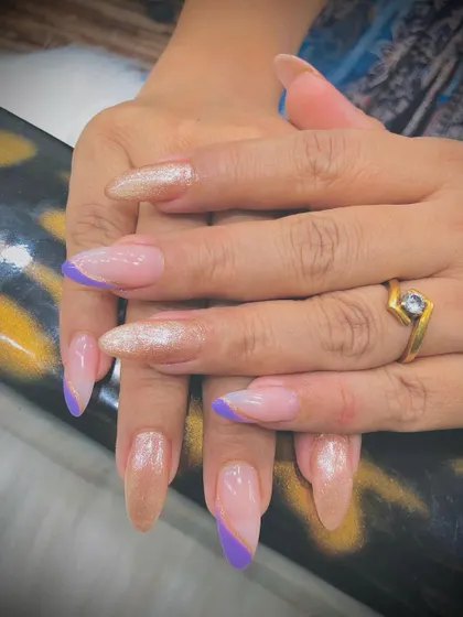 Another view of the golden and lavender set, showing the almond shape.