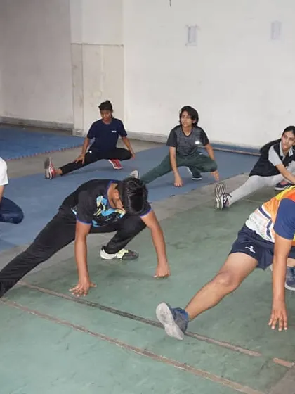 Fencers perform deep stretches to improve flexibility in their legs and hips. This is vital for executing the explosive lunges and quick direction changes required in fencing.