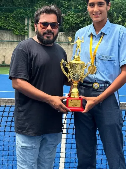 Presenting the team trophy to one of our CBSE Cluster Championship winners. These victories are a result of the strong partnership between our academy and M.M. Public School.