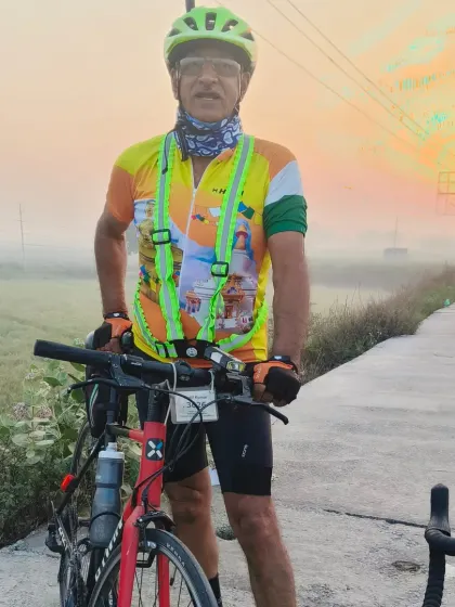 A rider against the sunrise on Holi. Our festival rides are full of energy and vibrant colors.