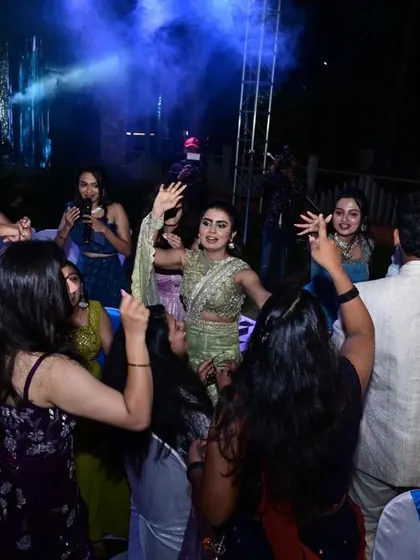 A fun dance moment at the Sangeeth. My outfits are designed for celebration.