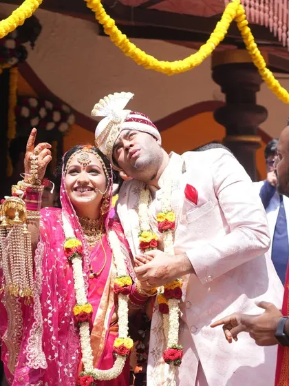 A moment of pure, uninhibited joy from Deep and Shagun's wedding. Her cheerful expression and his playful pose capture the fun and 'mast' vibe we encourage in our celebrations, free from heavy demands.