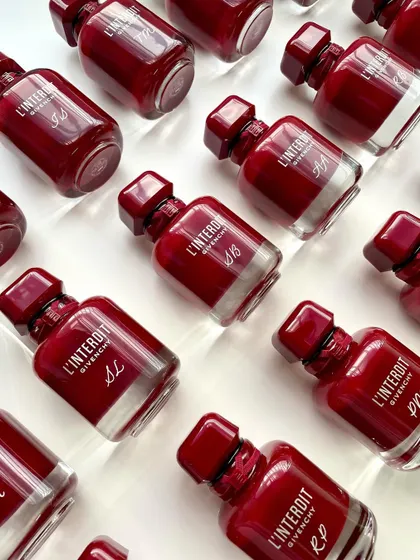 A flat lay of the engraved Givenchy bottles. It's always a pleasure to work with this brand, and the final result of a bulk order is so satisfying to see.