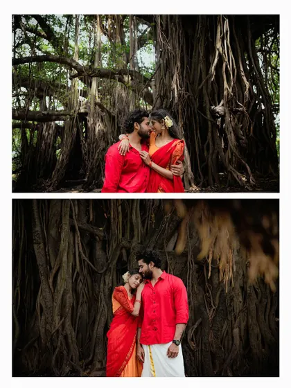 A dramatic portrait of a couple embracing in front of the massive roots of a banyan tree.