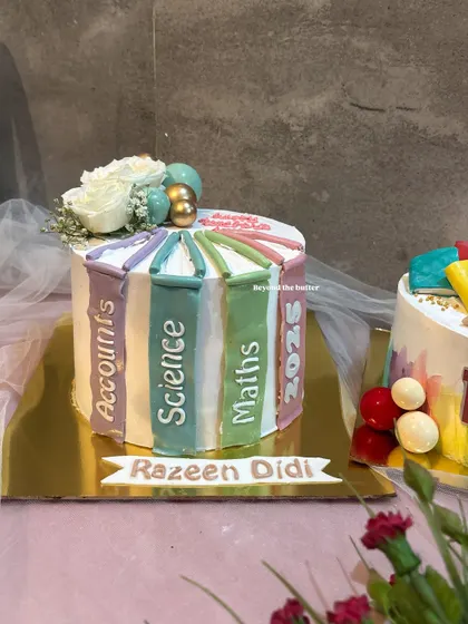 Another version of my popular book stack cake, this time with subjects like Accounts, Science, and Maths. A perfect way to celebrate a beloved teacher or a recent graduate.