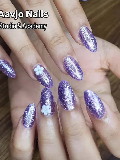 Another view of the sparkling lavender glitter nails. This shows how the glitter catches the light from every angle.
