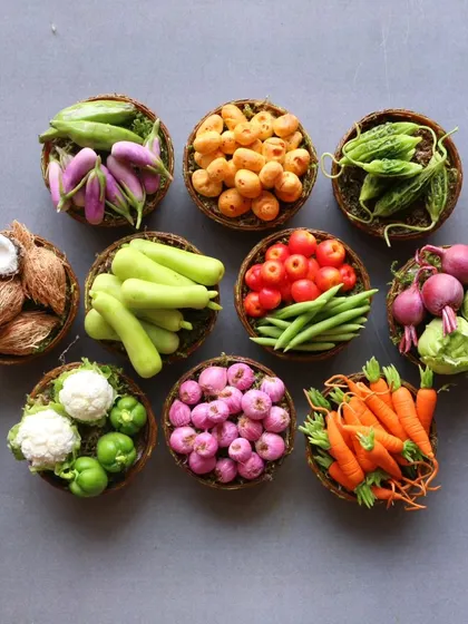 A beautiful flat lay of the miniature vegetable baskets, showing the variety of colors and textures.