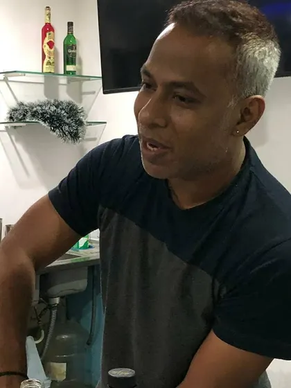 A candid moment of conversation behind the bar during a private cocktail session. I believe the best service comes from genuine interaction and understanding what my clients are looking for.