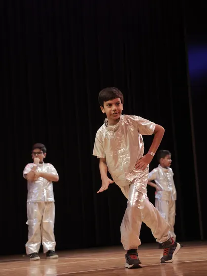 One of the 'Swagger Boys' striking a pose. These kids have amazing stage presence.