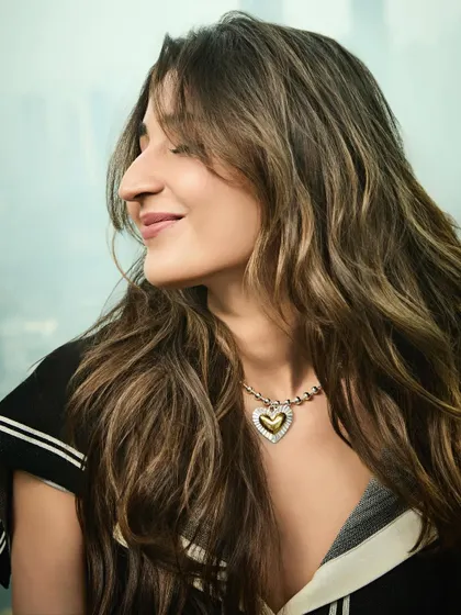 A moment of pure bliss. This shot captures a happy, relaxed mood, showing that style should make you feel good.