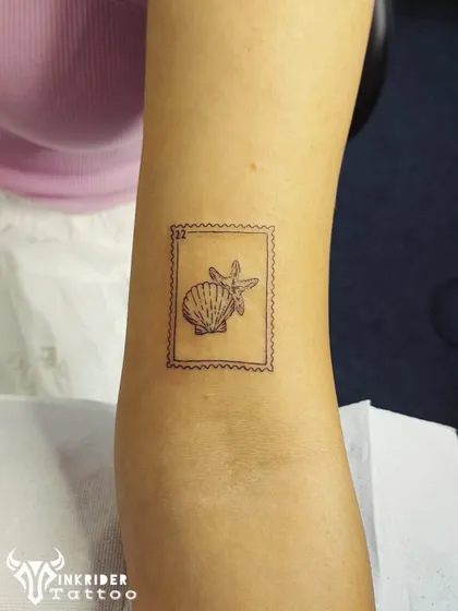 Another piece from our postage stamp series, this one featuring a seashell and starfish. It’s a perfect minimalist tattoo for lovers of the ocean.