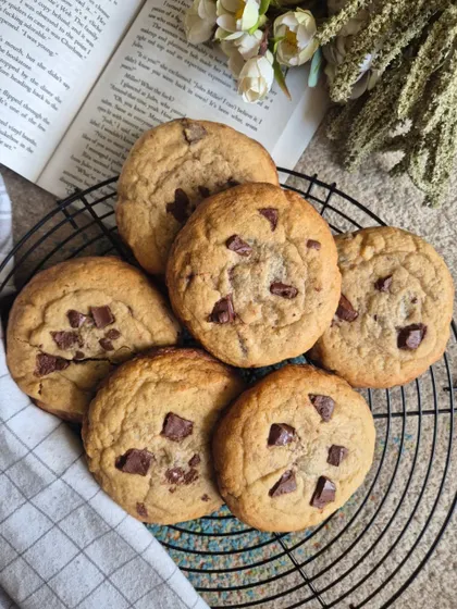 A classic shot of my chocolate chip cookies cooling on a wire rack. This is when the house smells the best. You can see the generous amount of chocolate chunks in each one.
