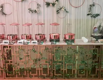 Another view of the Diwali buffet, with one of my chefs at the live counter in the background. This shows the combination of a beautiful display with the excitement of live cooking.