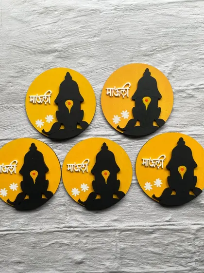 My 'Mauli' themed coasters or small hangings, also in a vibrant yellow, celebrating our devotion to Vitthal.