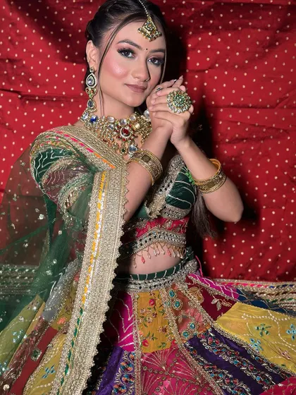 Our vibrant multi-color lehenga, perfect for a Mehendi ceremony. The mix of colors ensures you'll stand out in every photo.