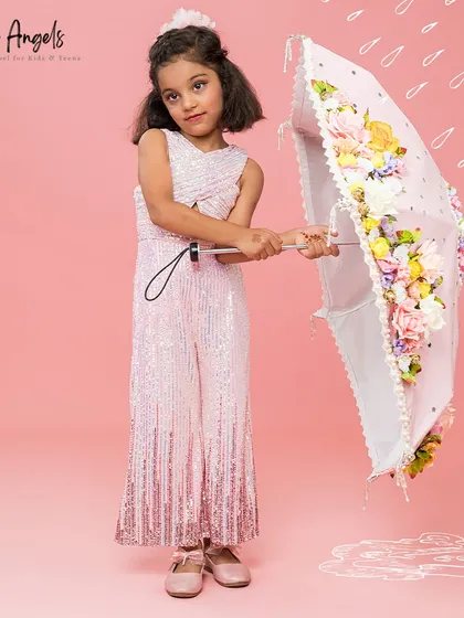 This "Millenia Jump Suit" in ombre pink sequins is a chic and comfortable alternative to a party dress.