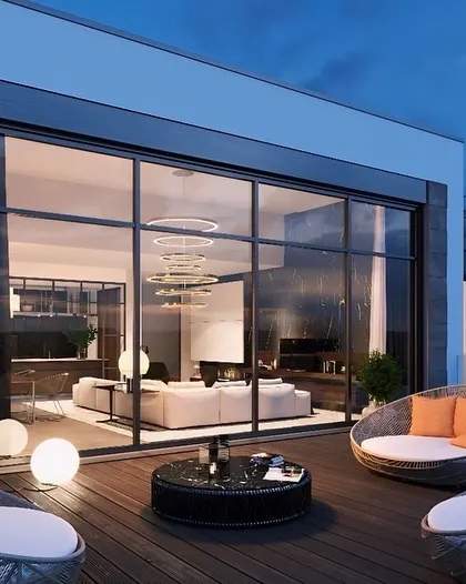 This prefabricated terrace lounge in Delhi NCR offers a complete, luxurious outdoor room. The design features floor-to-ceiling windows and comfortable, modern seating, providing a stylish retreat with panoramic views.